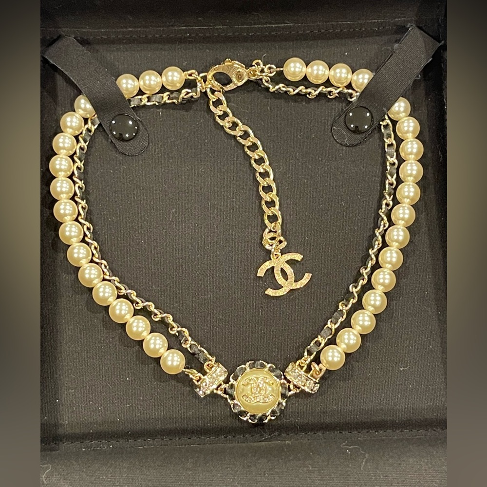 Chanel necklace, classic Pearl and braided chain duo.